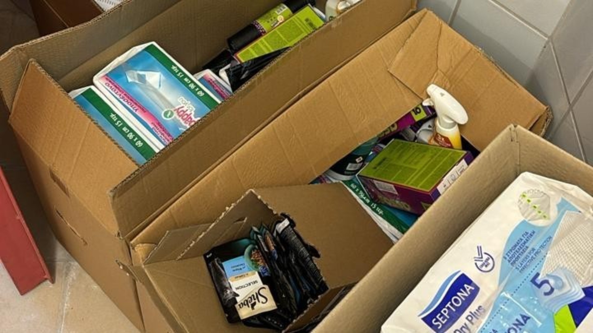 photo of previous delivery products arriving at charity