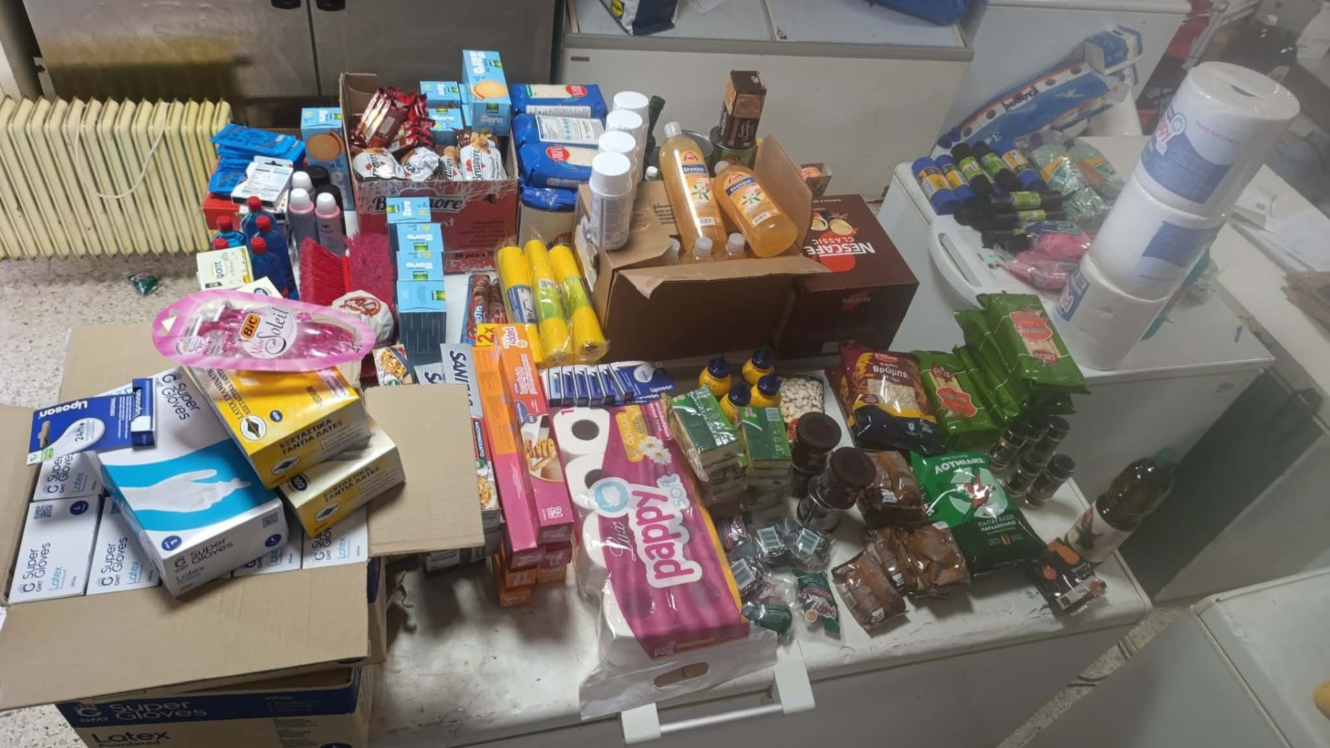 photo of previous delivery products arriving at charity