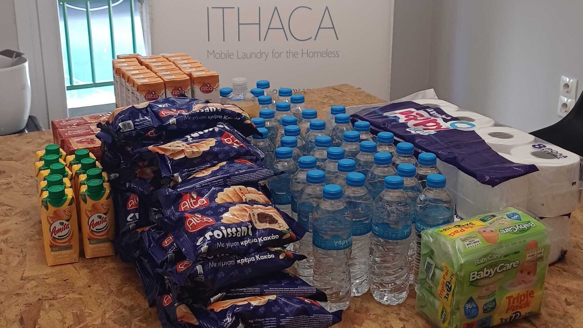 photo of previous delivery products arriving at charity