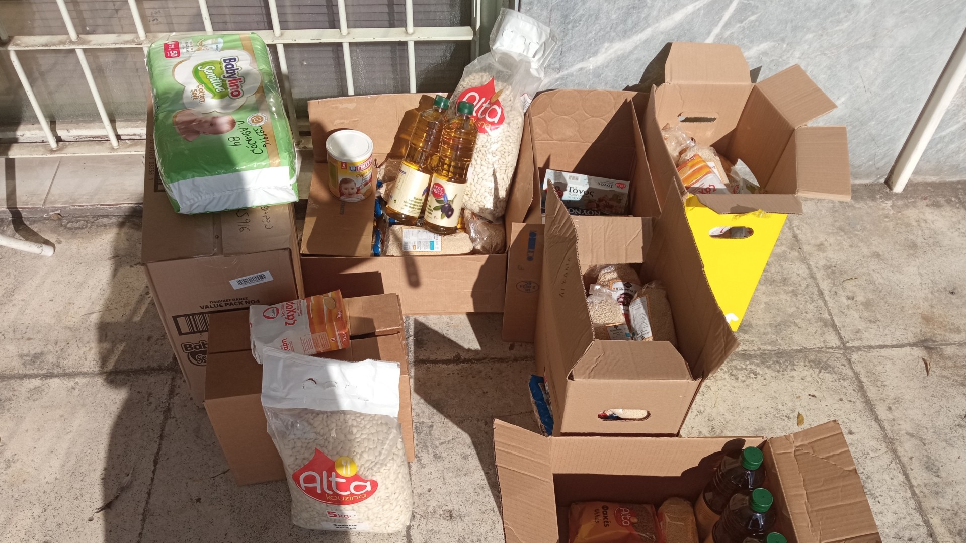 photo of previous delivery products arriving at charity