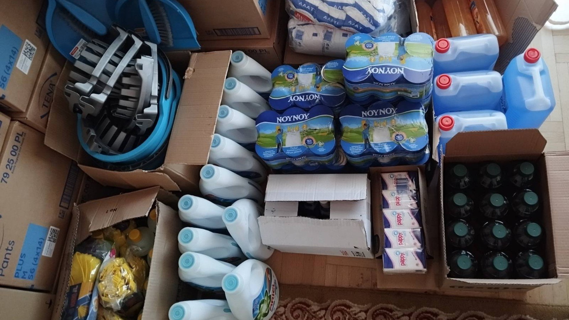 photo of previous delivery products arriving at charity