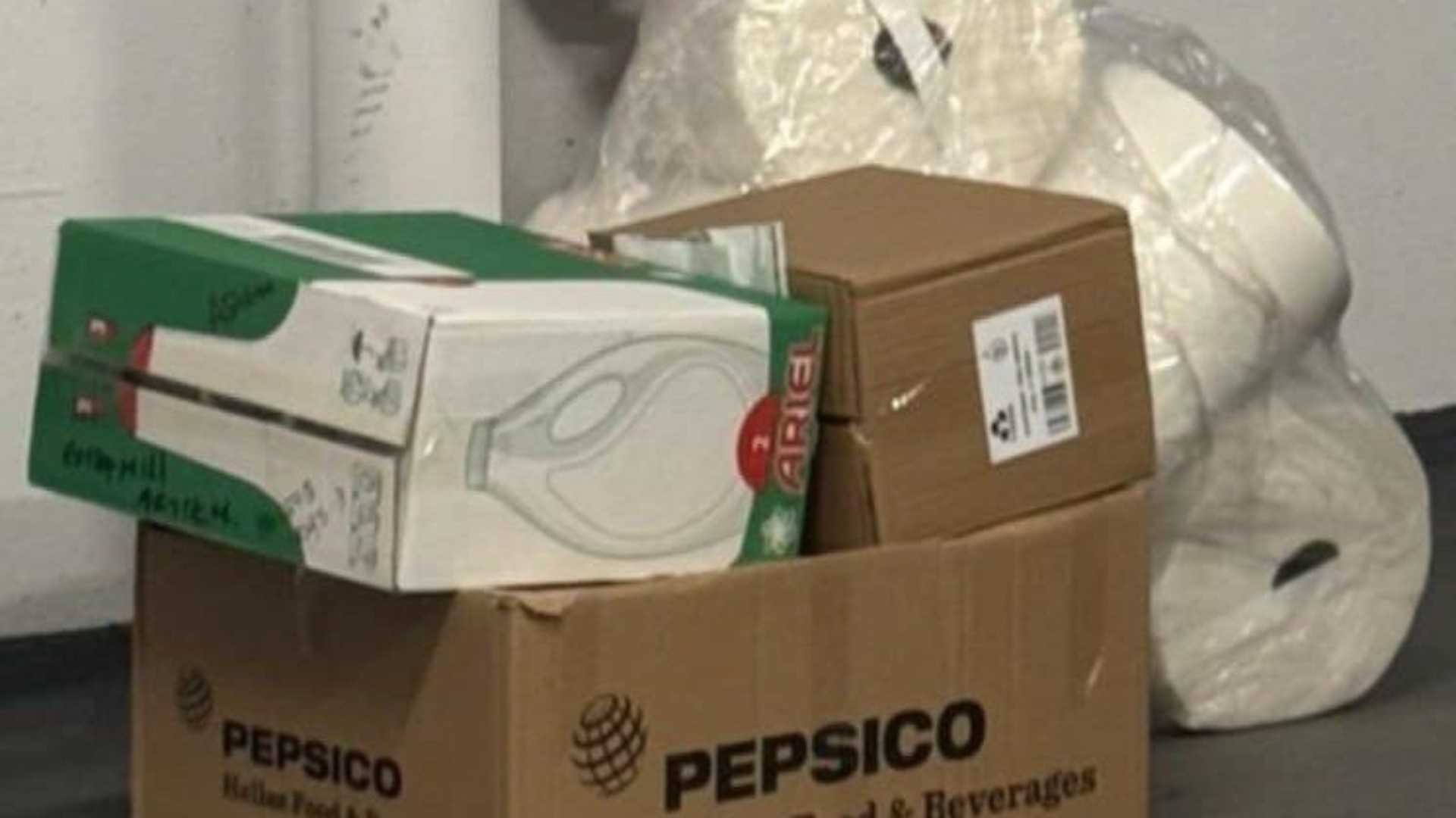 photo of previous delivery products arriving at charity