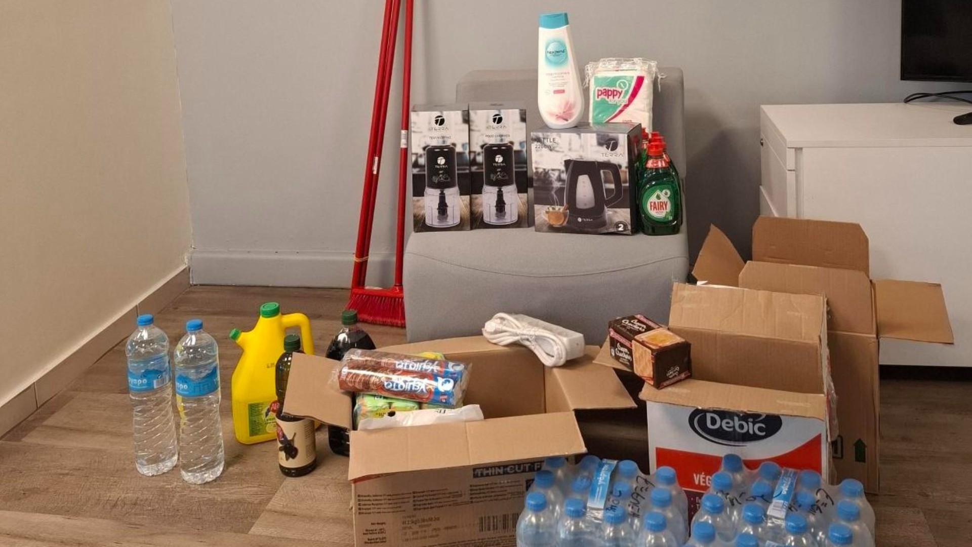 photo of previous delivery products arriving at charity