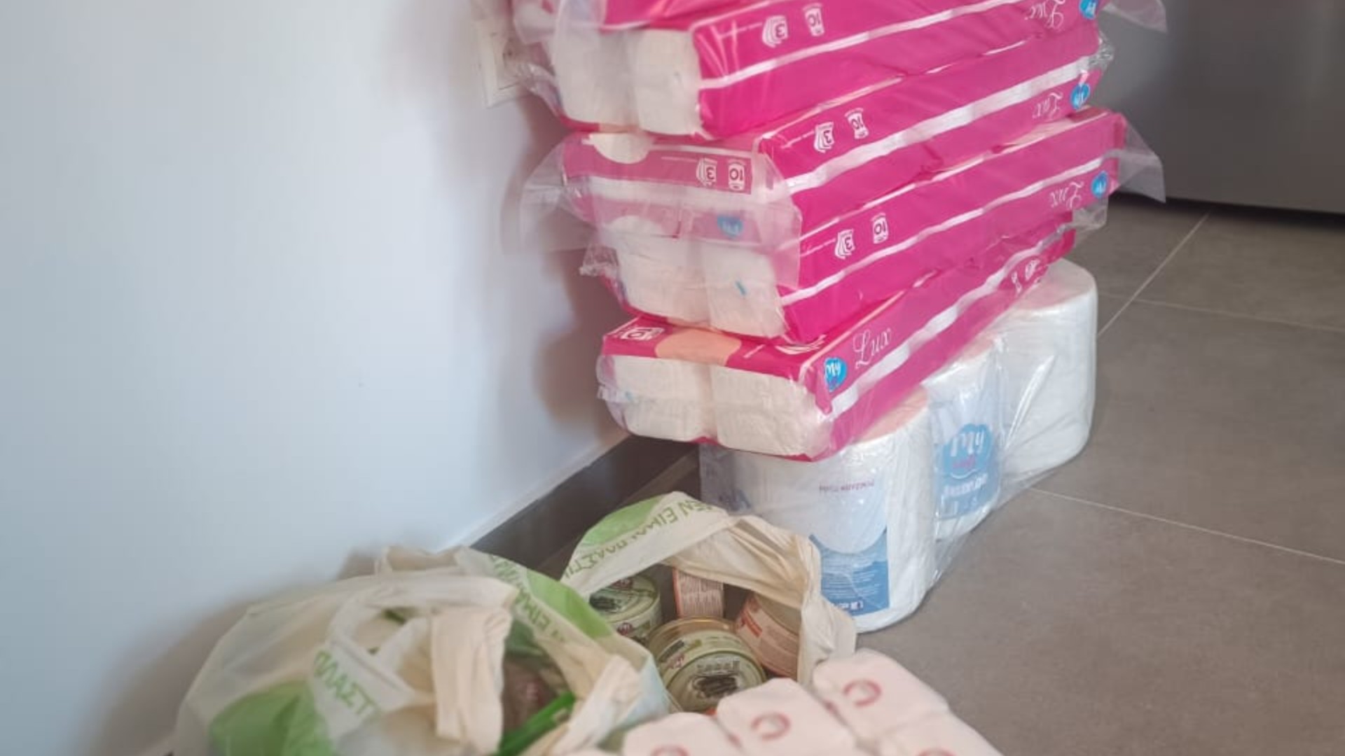 photo of previous delivery products arriving at charity