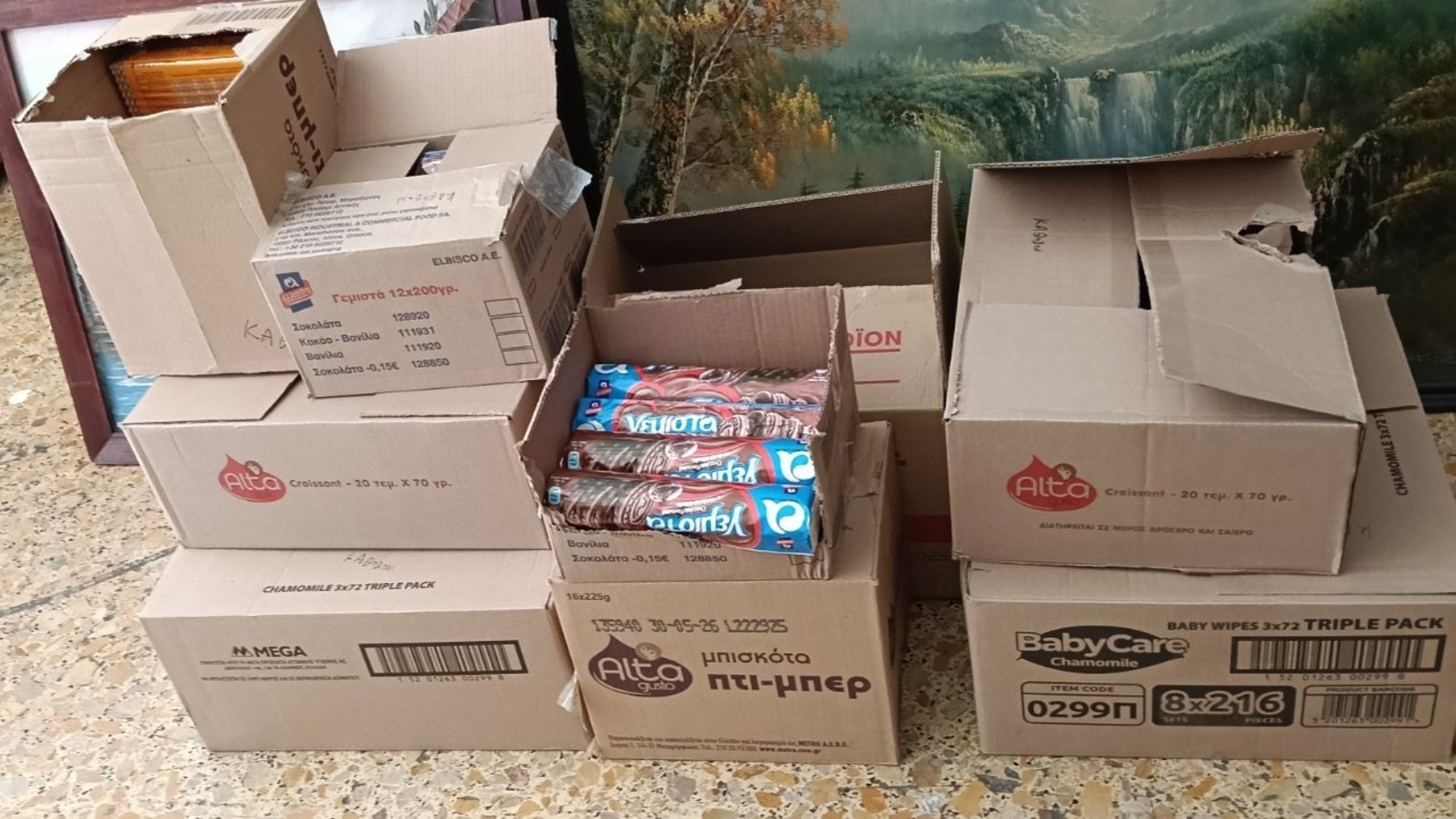 photo of previous delivery products arriving at charity