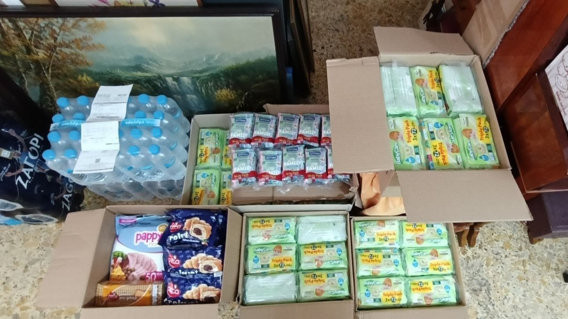 photo of previous delivery products arriving at charity
