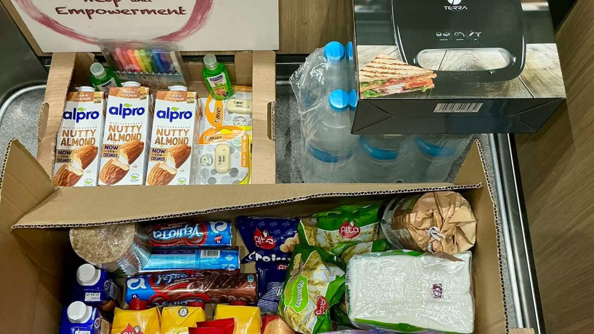 photo of previous delivery products arriving at charity