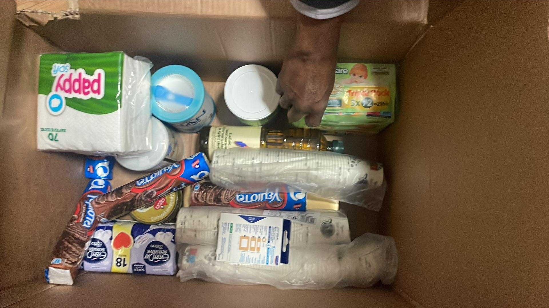 photo of previous delivery products arriving at charity