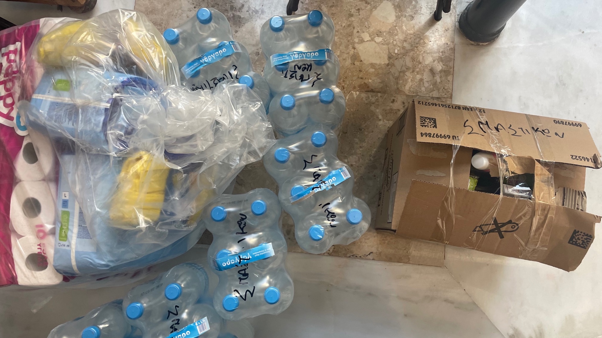 photo of previous delivery products arriving at charity