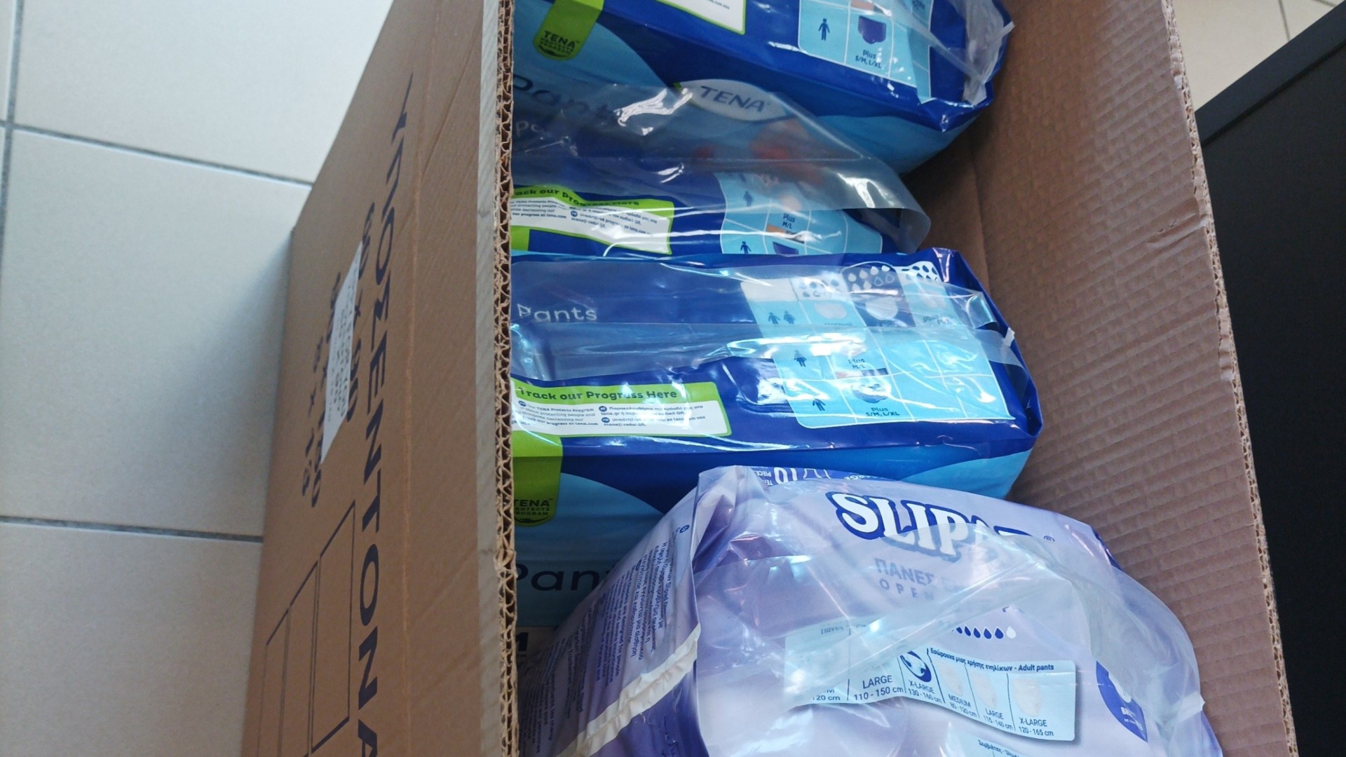 photo of previous delivery products arriving at charity