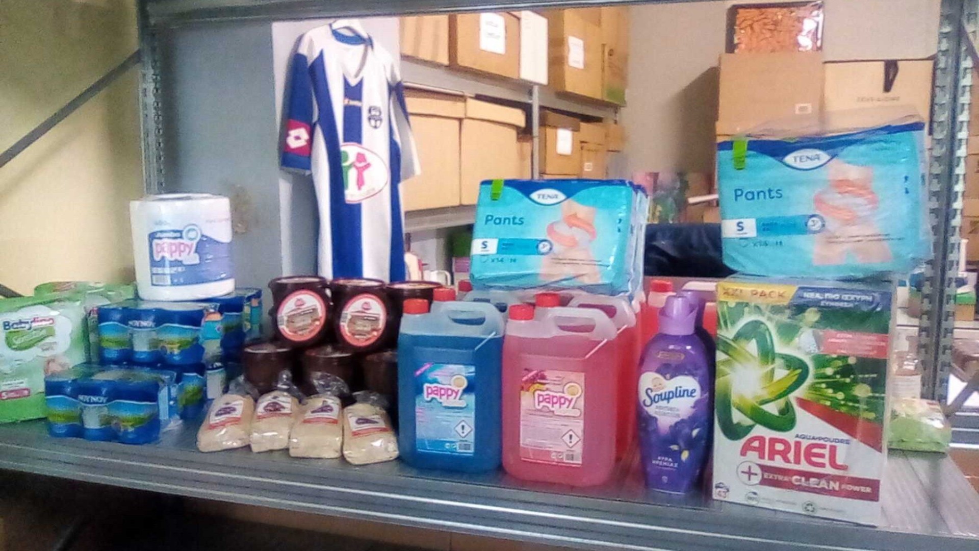 photo of previous delivery products arriving at charity