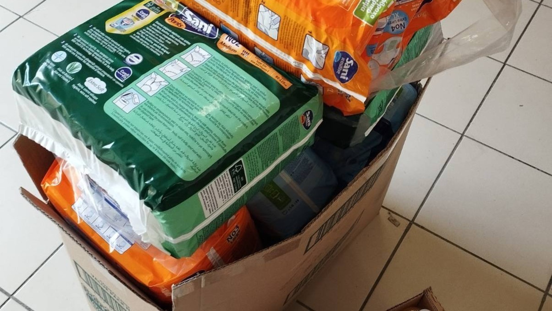 photo of previous delivery products arriving at charity