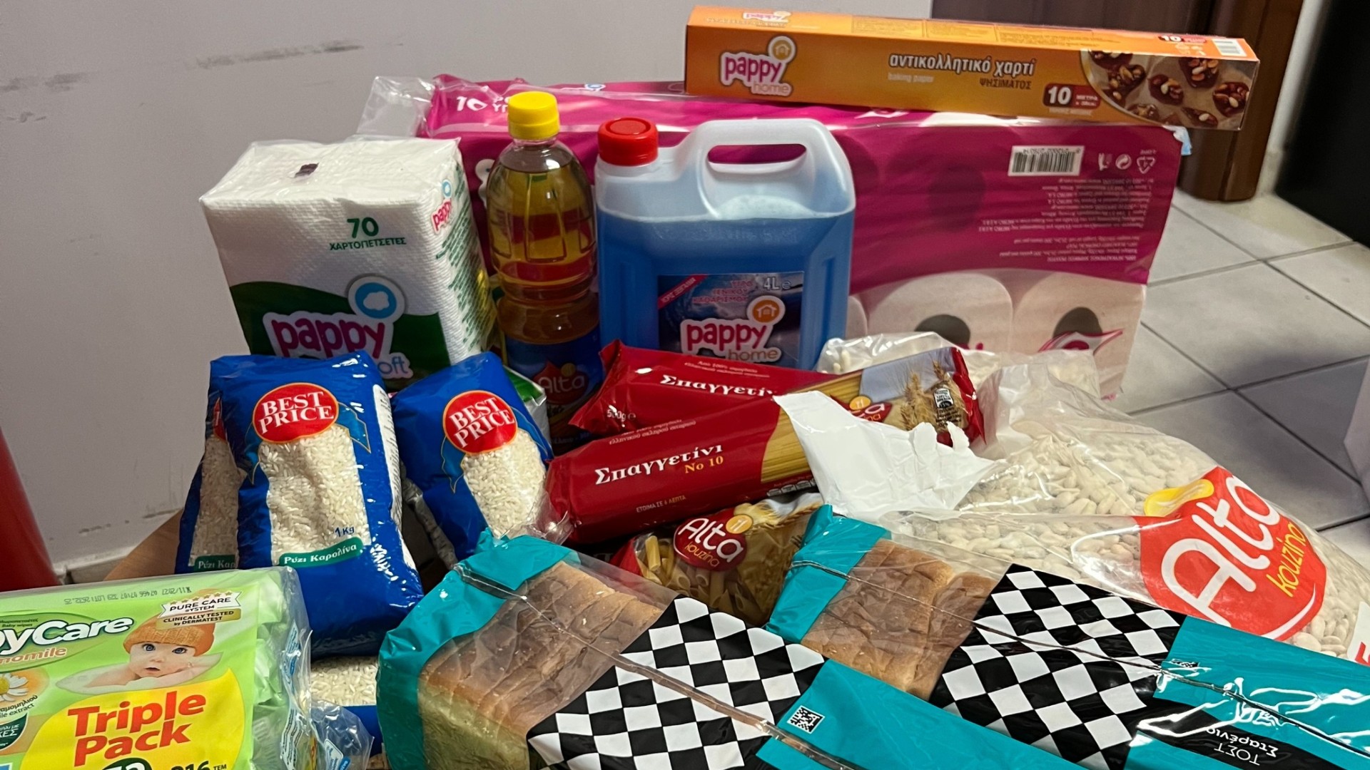 photo of previous delivery products arriving at charity