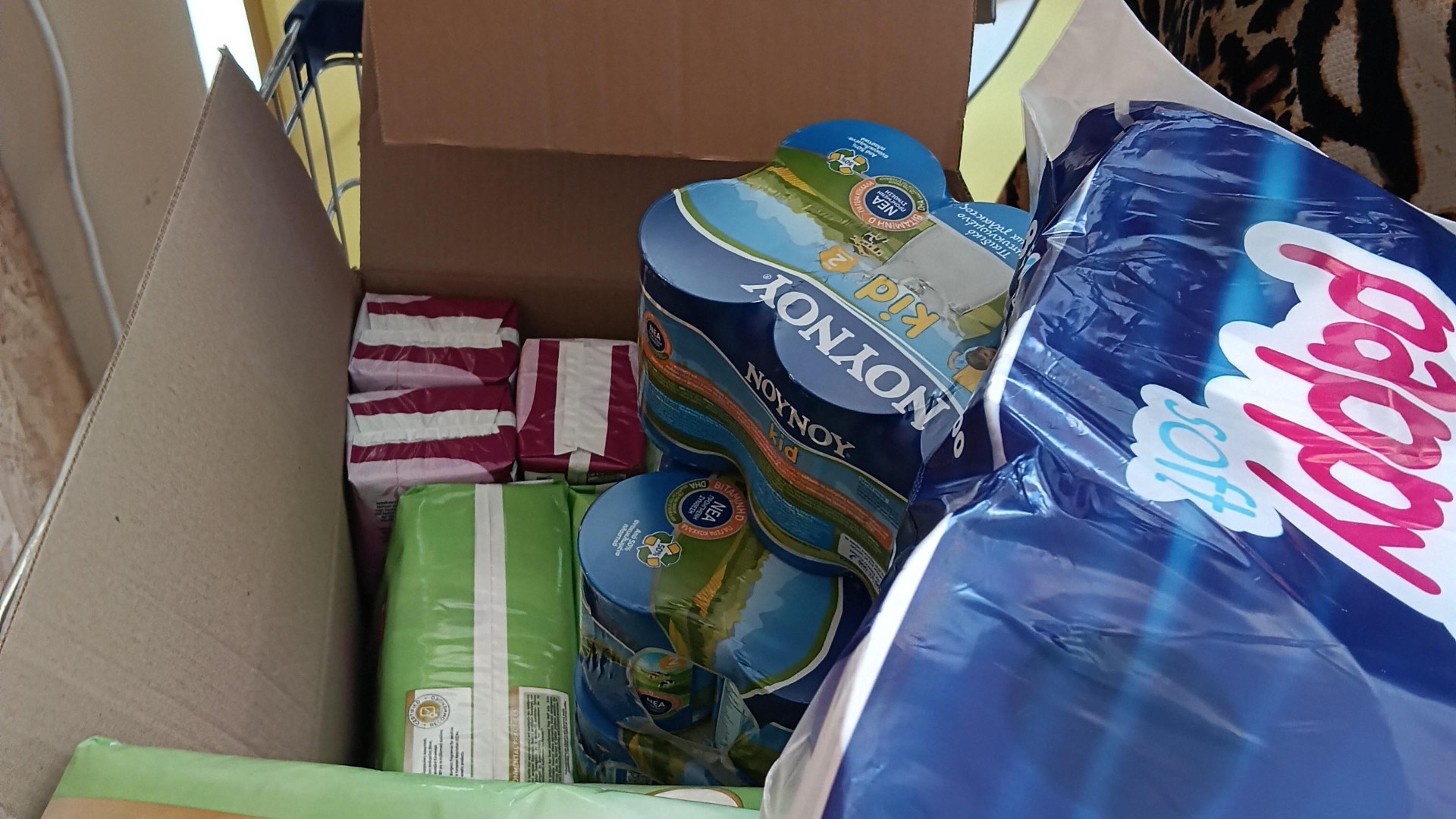 photo of previous delivery products arriving at charity