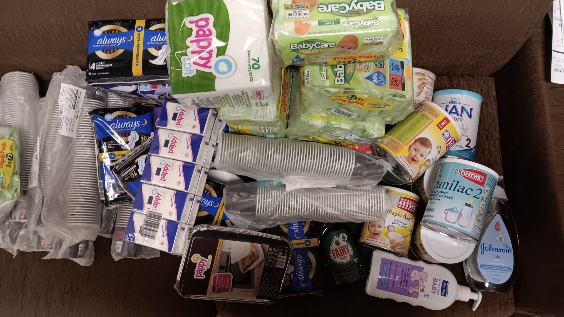 photo of previous delivery products arriving at charity